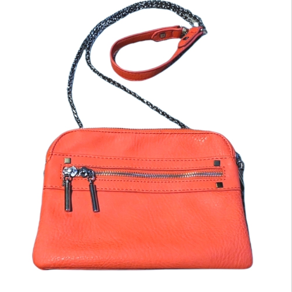 Miztrique Bright Coral color crossbody bag with silver chain strap.
